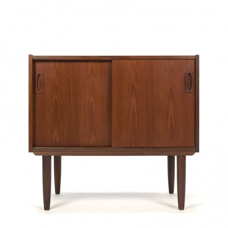 Vintage small teak cabinet with sliding doors