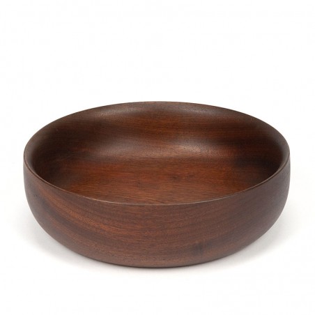 Round dark vintage bowl in teak