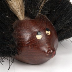 Vintage hedgehog figurine as a brush Scandinavian design