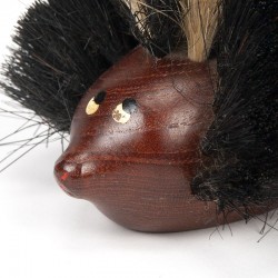 Vintage hedgehog figurine as a brush Scandinavian design