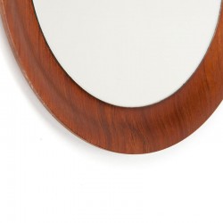 Round small model vintage Danish mirror on leather cord