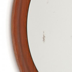 Round small model vintage Danish mirror on leather cord