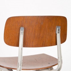 Set of 4 wooden Revolt chairs designed by Friso Kramer